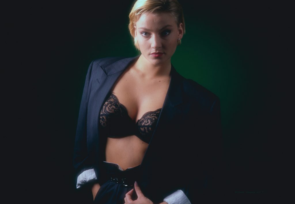 Blond Danish model, wearing suit, Black Bra